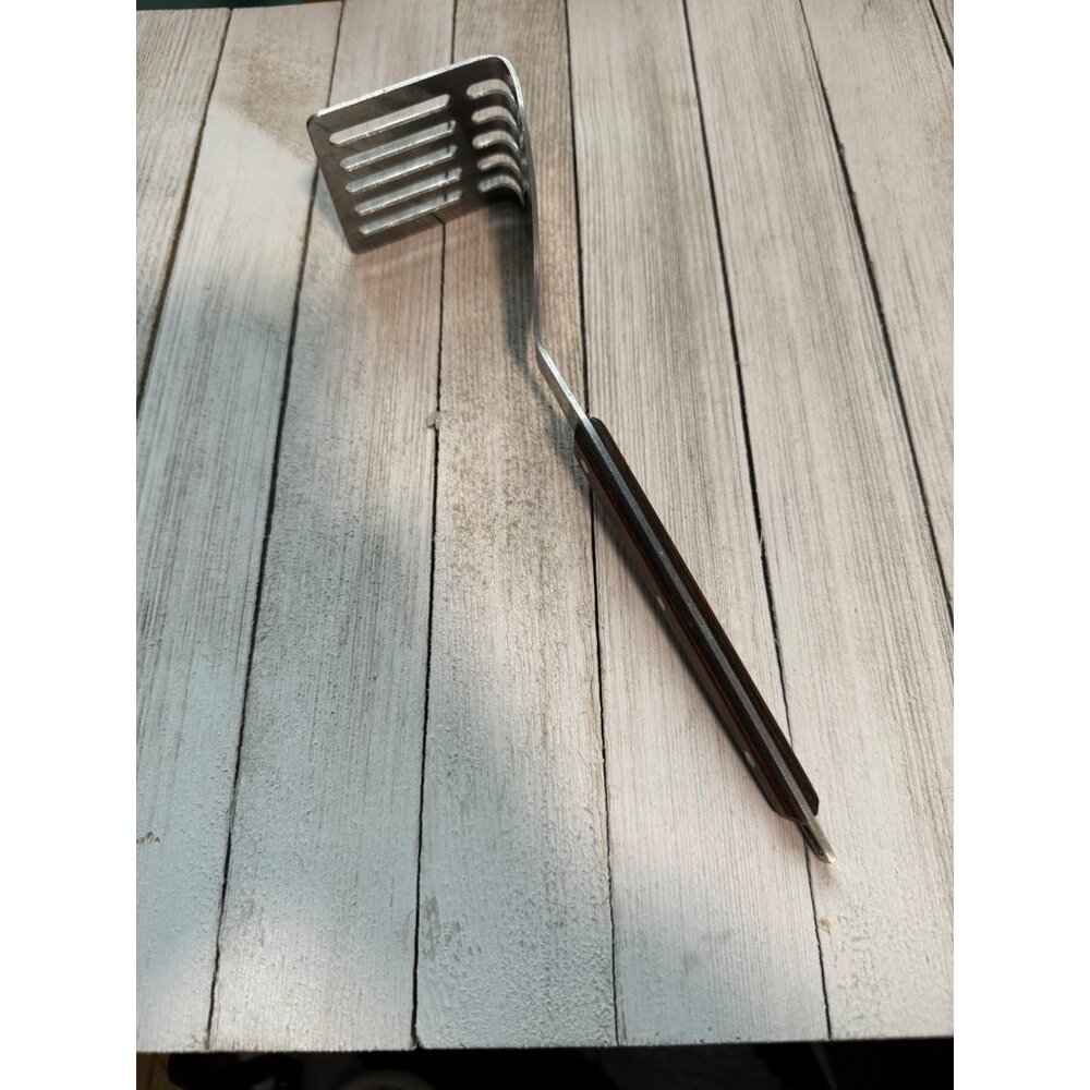 Right angle potato smasher. USA  Ekco Flint Stainless Steel With Wooden Handle